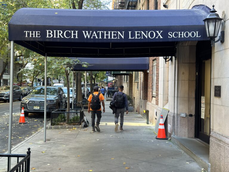 Image shows a blue awning over a sidewalk reading "The Birch Wathen Lenox School."